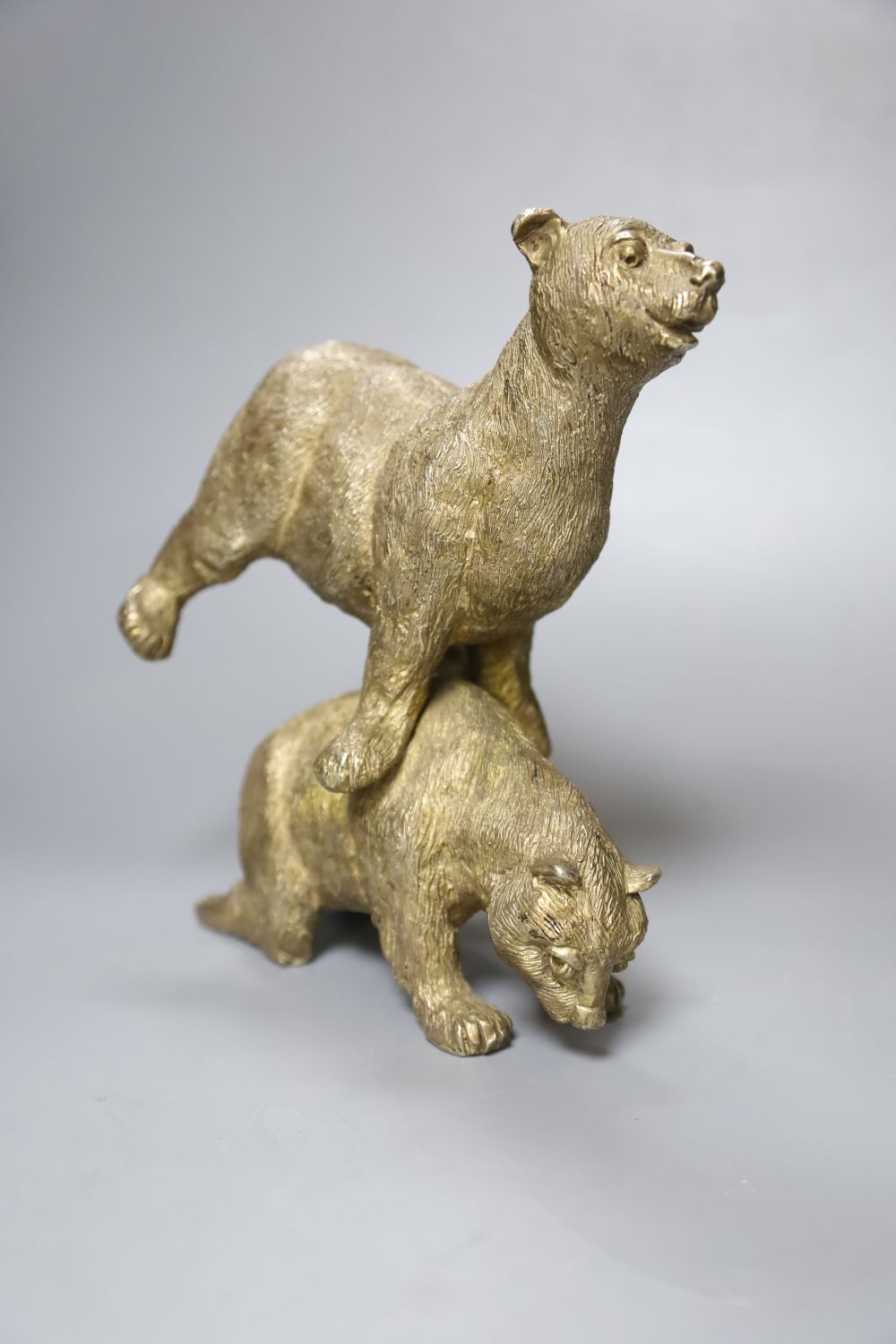 A silvered bronze group of two playful bears, height 20cm